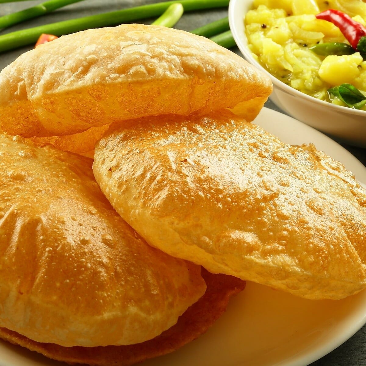 Yellow Pumpkin Poori (Parangikai Puri)