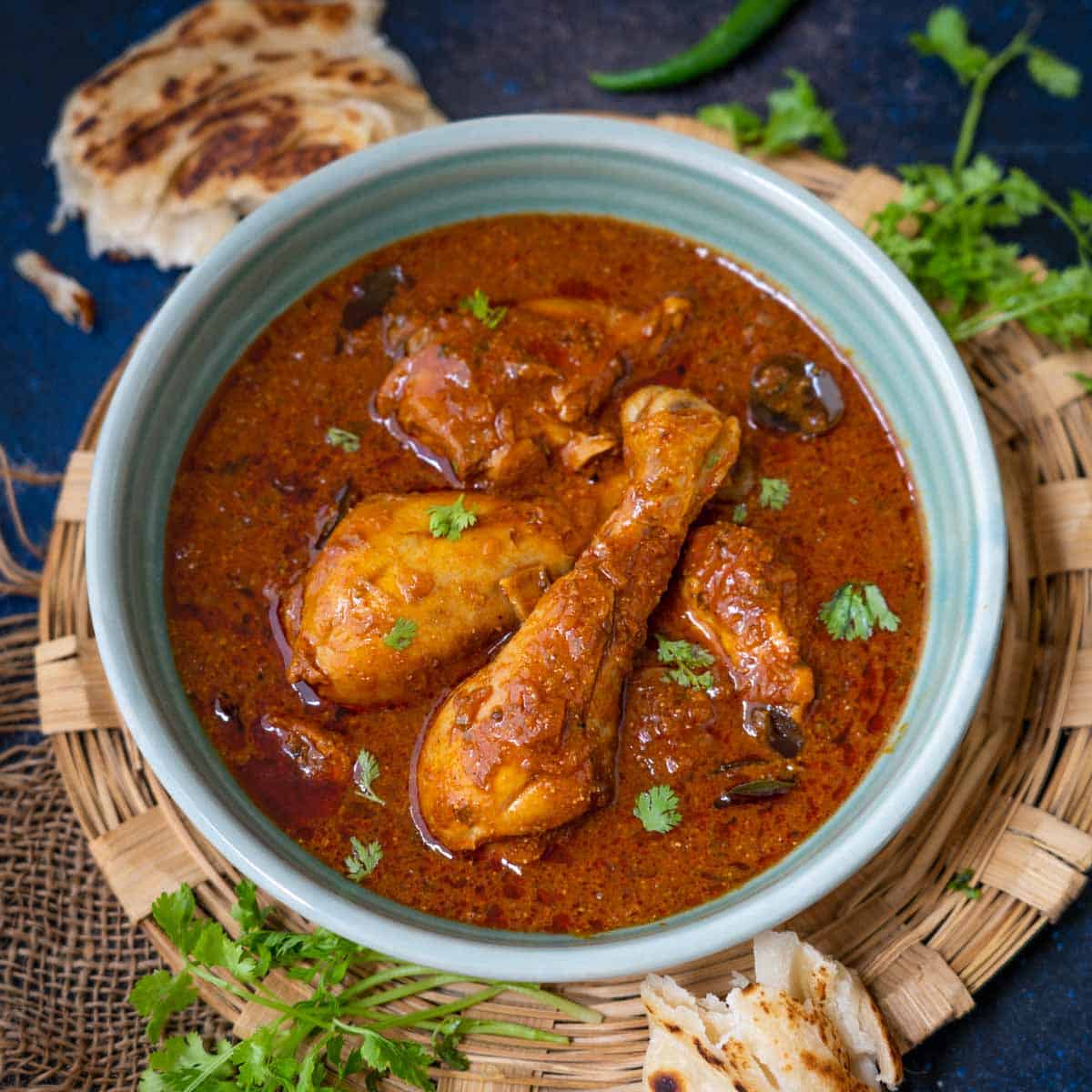Kobari Kodi Pulusu (Chicken in Dry Coconut Gravy)