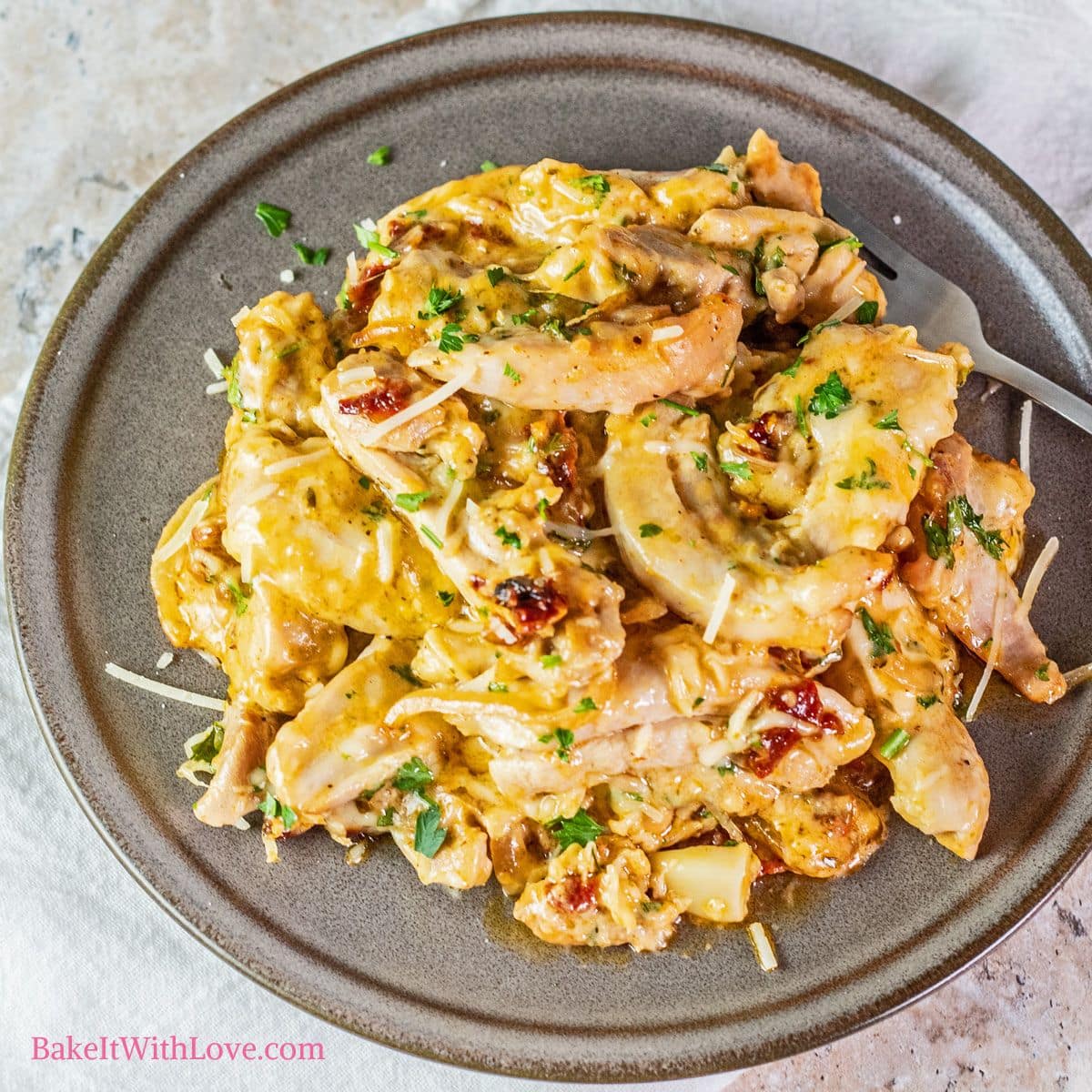 Cheesy Baked Tuscan Chicken And Onions