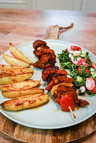 Pork Skewers With Baked Potatoes And Vegetable Salad