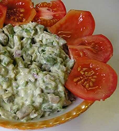 Appetizer with avocado and herring