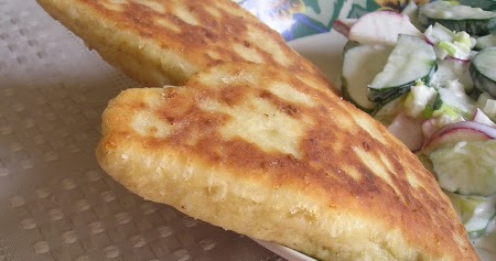 Fried half moons pies with spicy zucchini filling