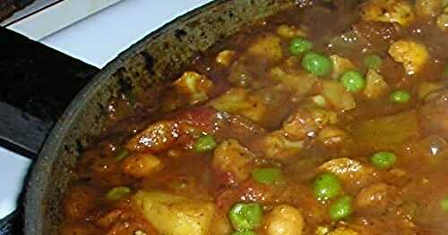 Indian-style curry with potatoes, cauliflower, peas and chickpeas