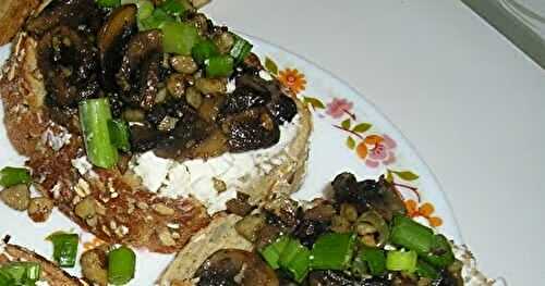 Mushrooms on toast with walnuts and goat cheese