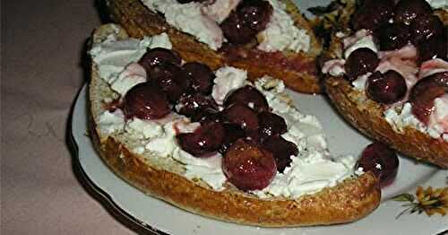 Toasts with chevre and sauteed grapes 