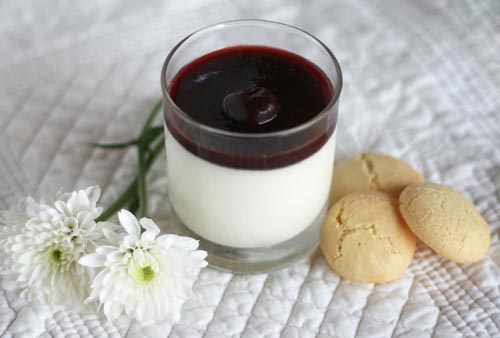 Limoncello Panna Cotta with Black Cherry Sauce