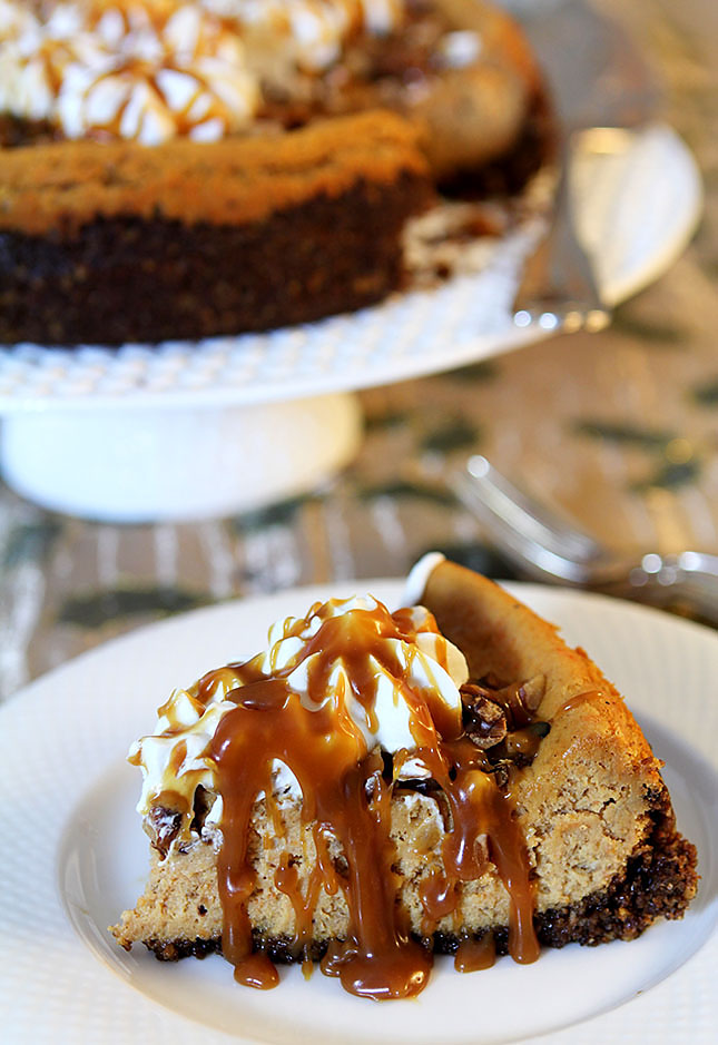 Pumpkin Cheesecake with Walnuts and Bourbon Caramel Sauce