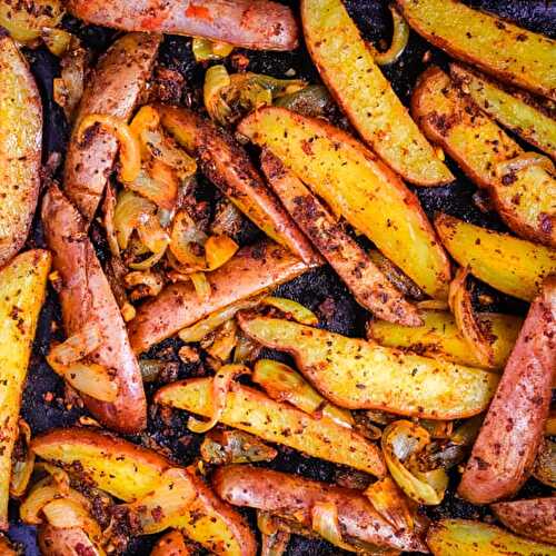 Seasoned oven-baked potato wedges with onions