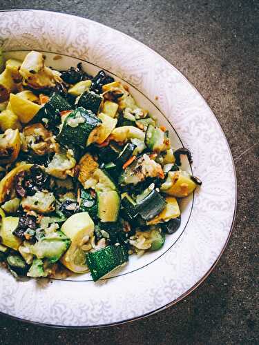 Roasted zucchini and crookneck squash with pumpkin seeds, oregano, and olives