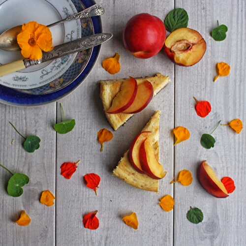 Summer season baked nectarine cheesecake with a biscuit and pink peppercorn base