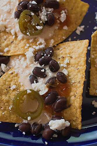 White Cheese Nachos With Black Beans, Salsa and Jalapenos