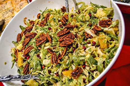 BRUSSELS SPROUTS SALAD WITH POMEGRANATE ORANGE VINAIGRETTE AND PECANS