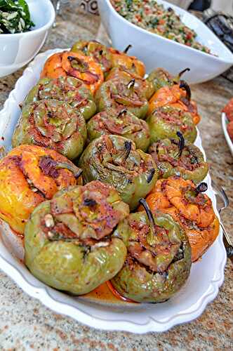 OVEN ROASTED HERB AND RICE STUFFED BELL PEPPERS WITH A TOMATO SAUCE