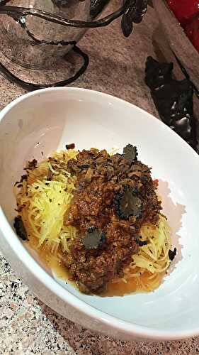 SPAGHETTI SQUASH WITH TUSCAN SAUSAGE BOLOGNESE SAUCE AND BLACK TRUFFLES
