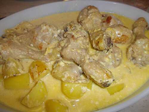 Chicken drumstick with soft creamy cheese and potatoes