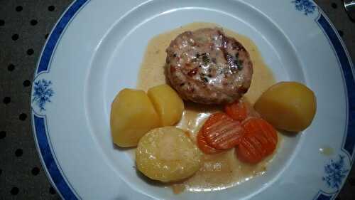 Flat white wine sausage in a pork fat caul and potatoes