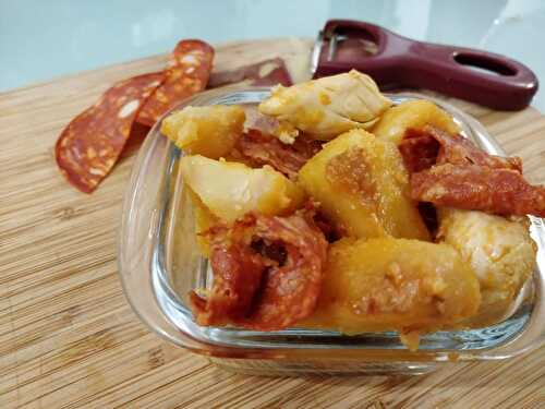 fried potatoes with chicken and chorizo sausages