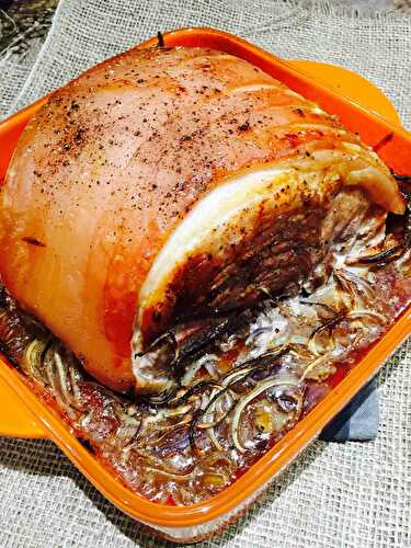 Roast pork in a bath of beer and a bed of mixed onions