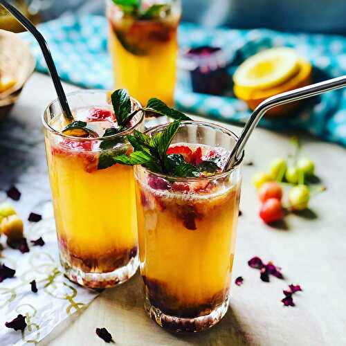 Summer cocktail with orange and passion fruit