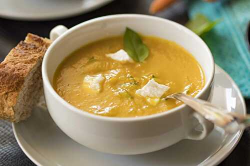 Cold carrot soup with goat cheese and basil