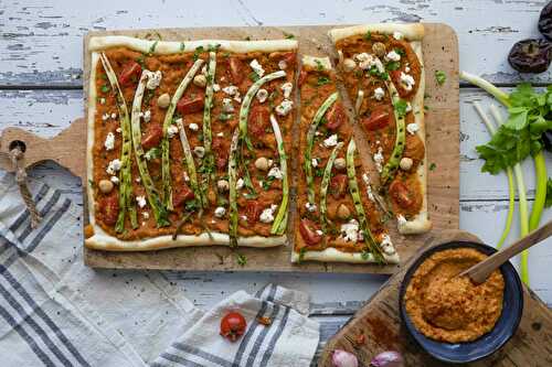 Pizza Romesco with grilled spring onions
