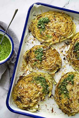 White cabbage steaks, made in the oven, with parsley dressing