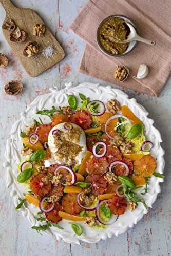 Orange salad with burrata cheese and nut dressing