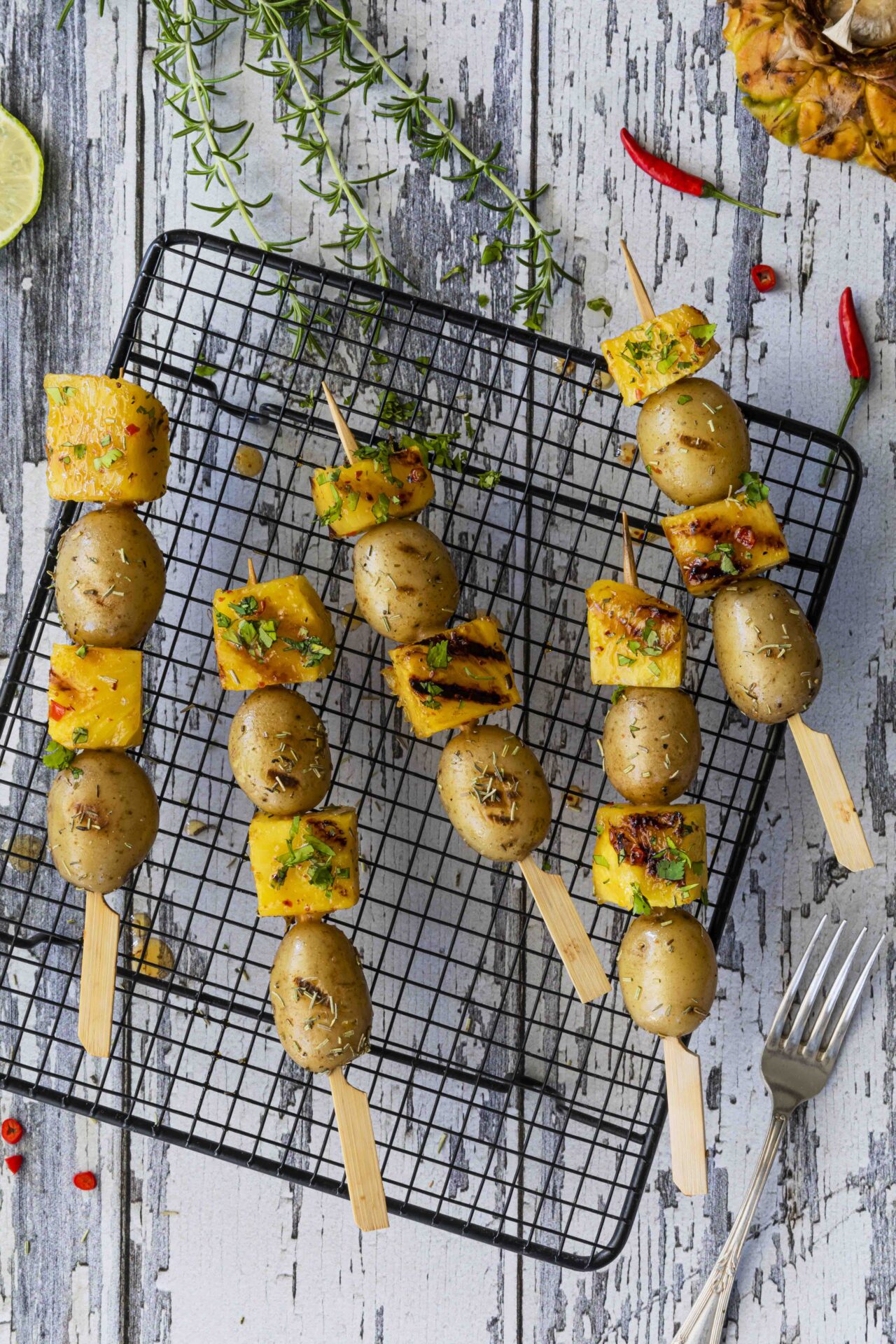 Potato skewers with spicy pineapple