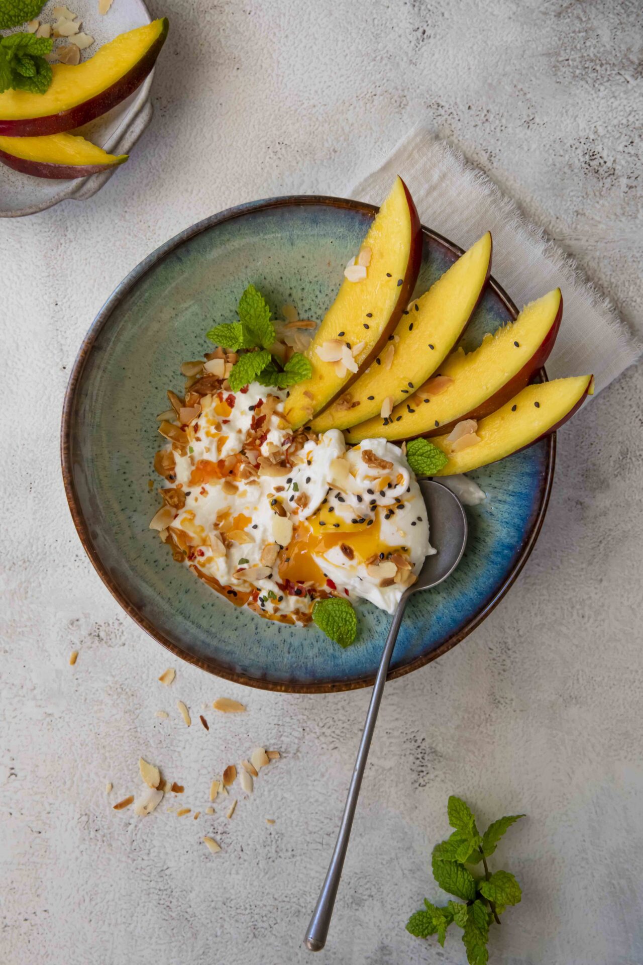 Burrata, poached egg and mango breakfast