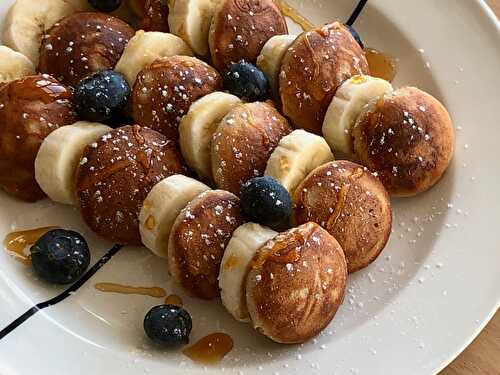 Dutch mini buckwheat pancakes with banana and blueberries