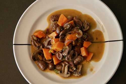 Stew of chicken hearts with pumpkin and mushroom