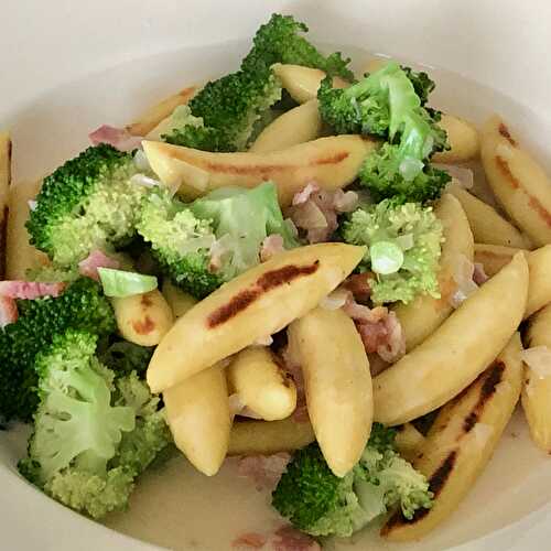 German Schupfnudel with broccoli and bacon strips