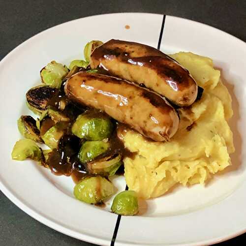 Mashed potatoes with French Boursin. Sided by Brussels sprouts and sausages