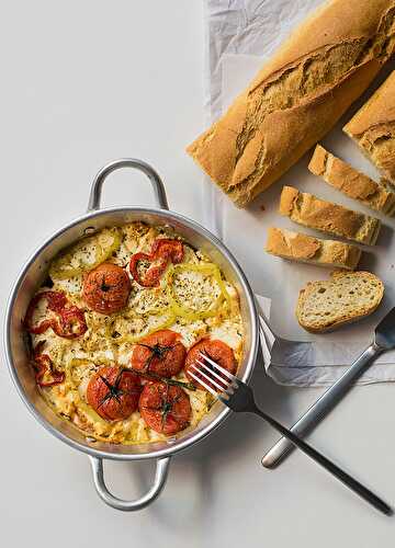 Baked feta cheese with tomatoes and horn peppers