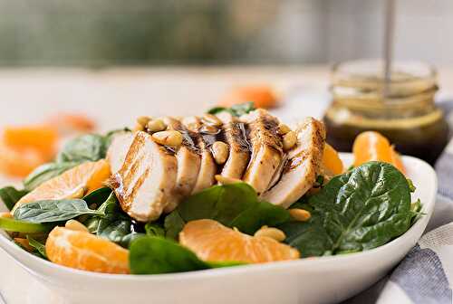 Green salad with chicken, tangerines and spinach
