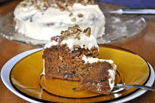 Carrot Pecan Cake with Cream Cheese Frosting; grating v shredding