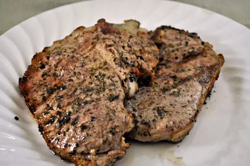 Nude Blondes basking in the sun, and Veal Chops with Herbs, Lemon and Garlic