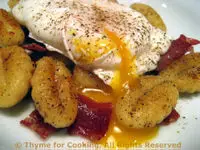 Poached Egg with Fried Gnocchi; He's a good boy! (apparently)