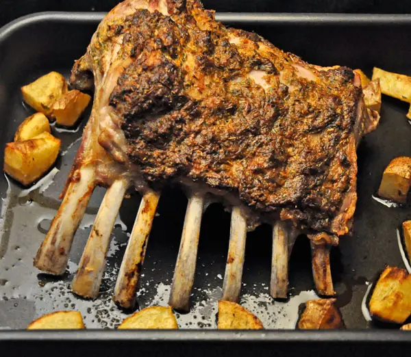 Roast Rack of Lamb and Potatoes; carving the rack