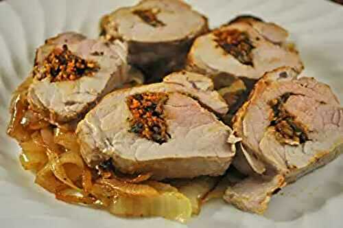 Stuffed Pork Tenderloin on a Bed of Golden Onions